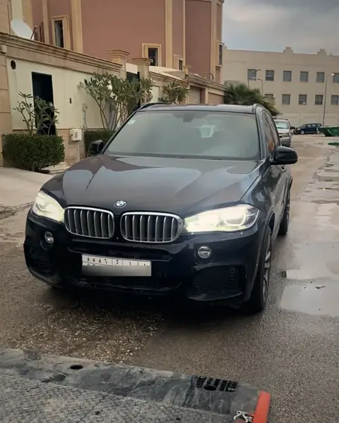 Flatbed transporting BMW X5